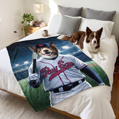 Cavalier King Charles spaniel with the Boston Paw Sox custom pet blanket: on the bed