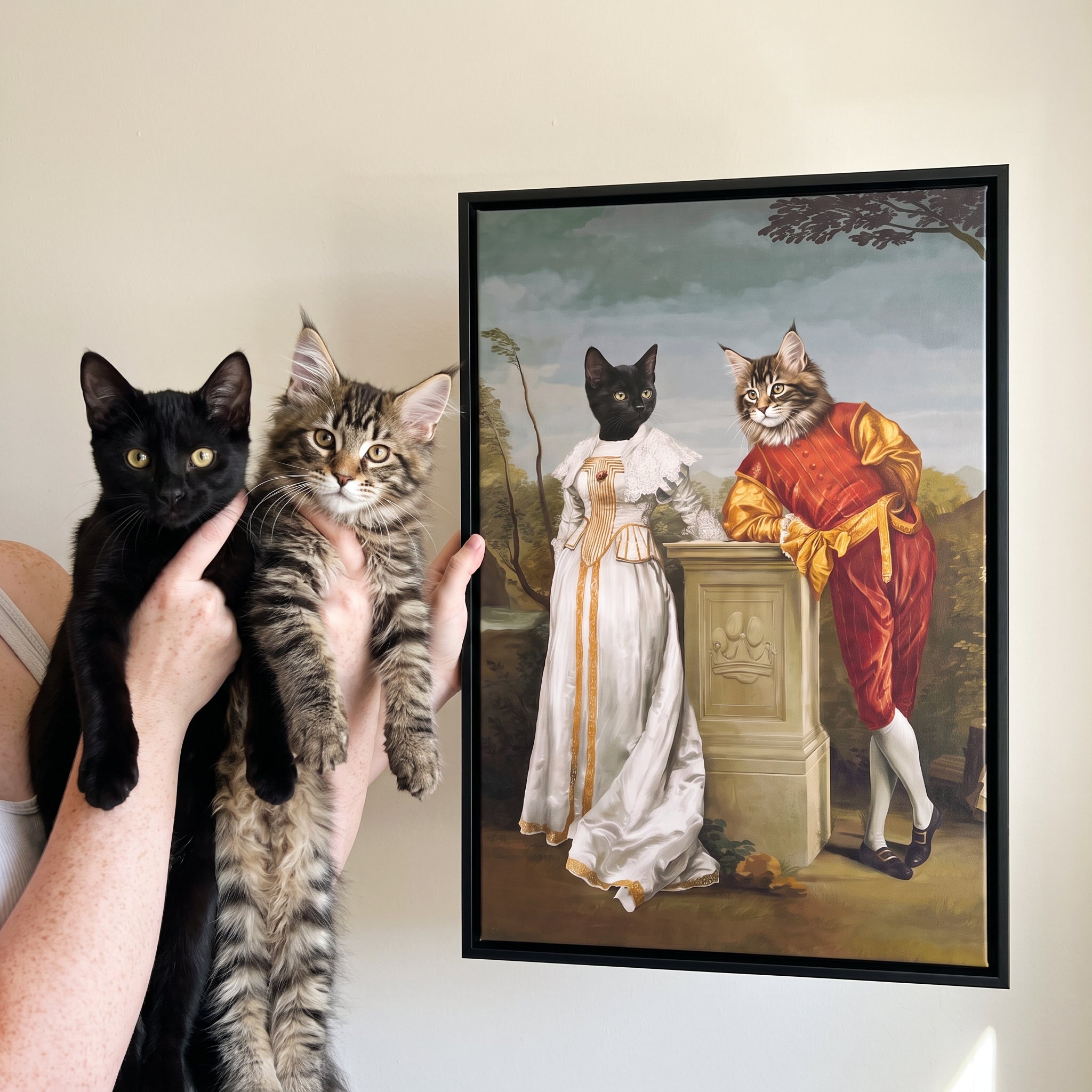 Black cat and fluffy maine coon cat next to its The Courtly Couple custom pet canvas