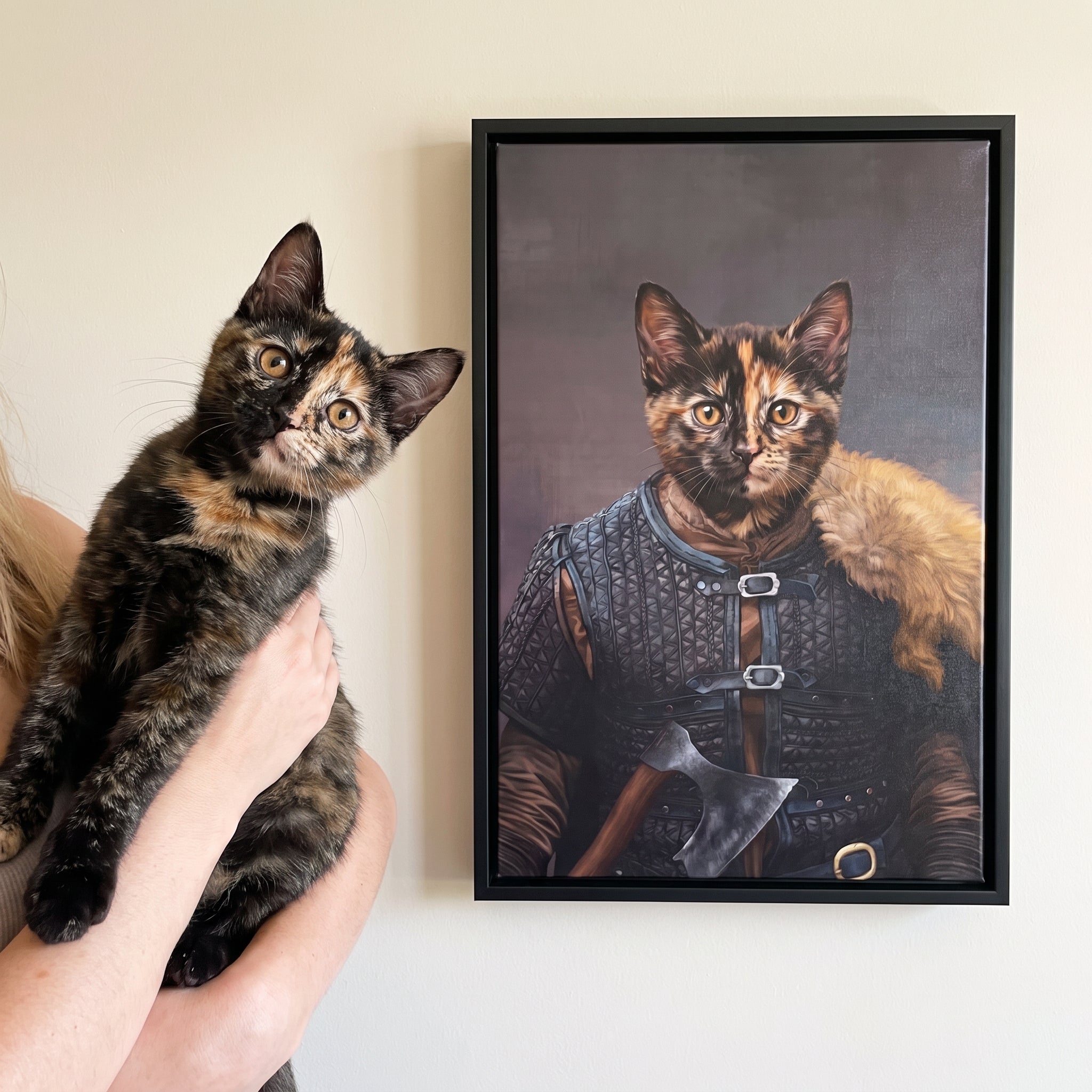 Tortoiseshell cat next to its The Viking custom pet canvas