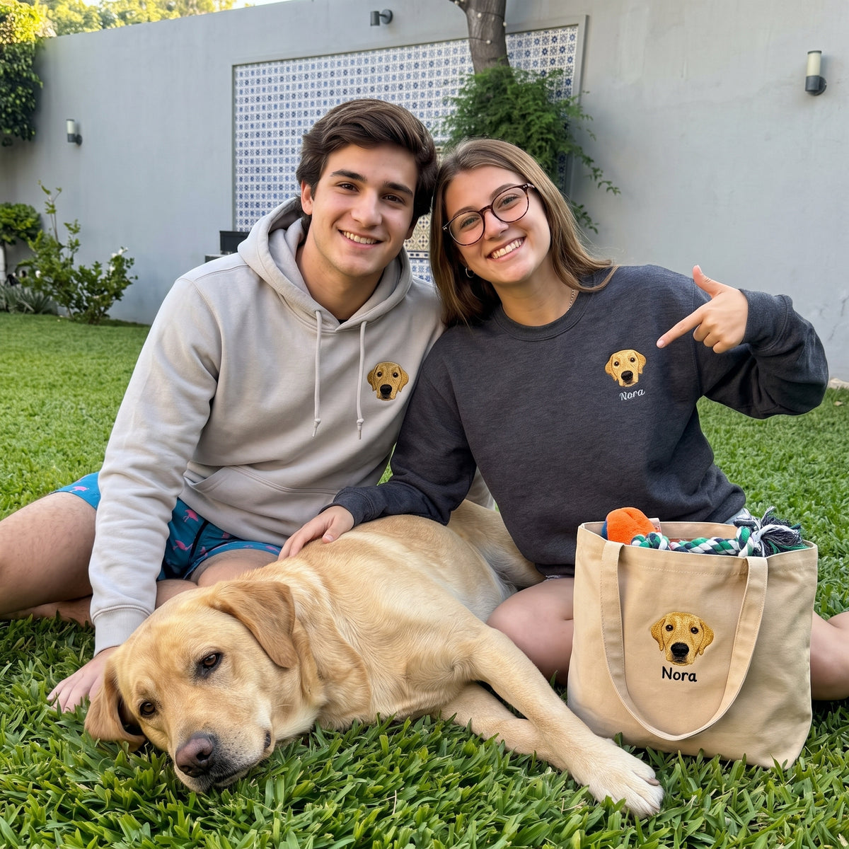 A matching embroidered sweatshirt and cushion