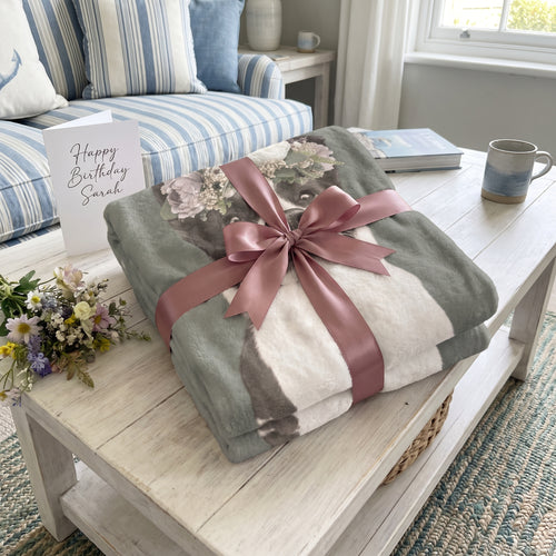 The Full Bloom custom pet blanket wrapped as a gift