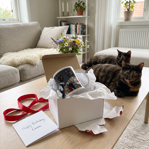 Two tortoiseshell cats with The Rulers custom mug: gift