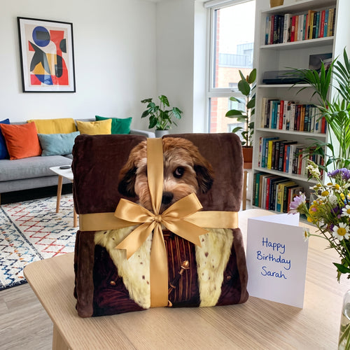 The Young King custom pet blanket wrapped as a gift